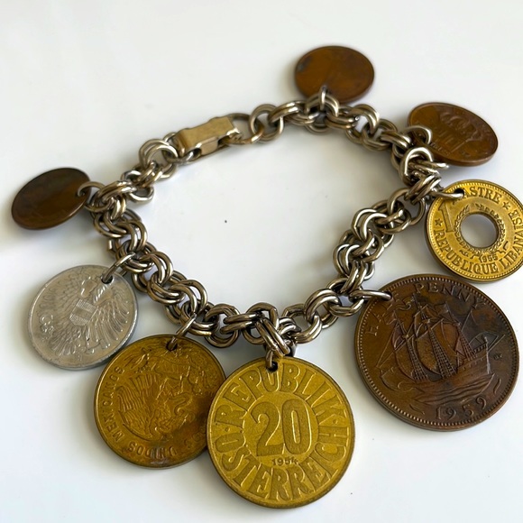Vintage coin charm bracelet with various European coins on a silver tone chain - Picture 1 of 12